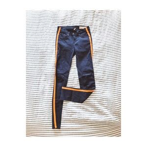 Rag & Bone skinny jean with orange tuxedo stripe.